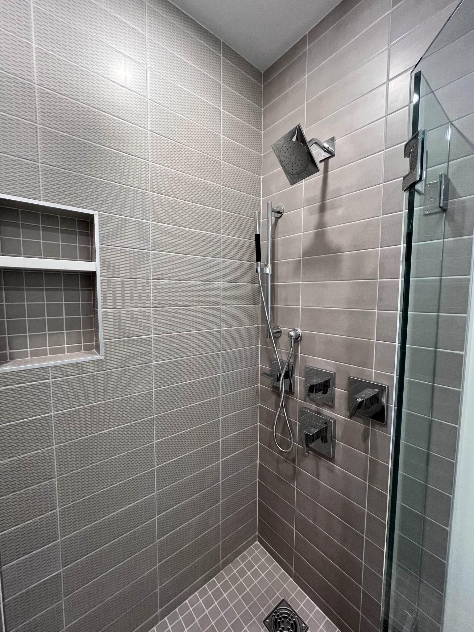 3 shower heads and custom tile. - 387 Commercial St