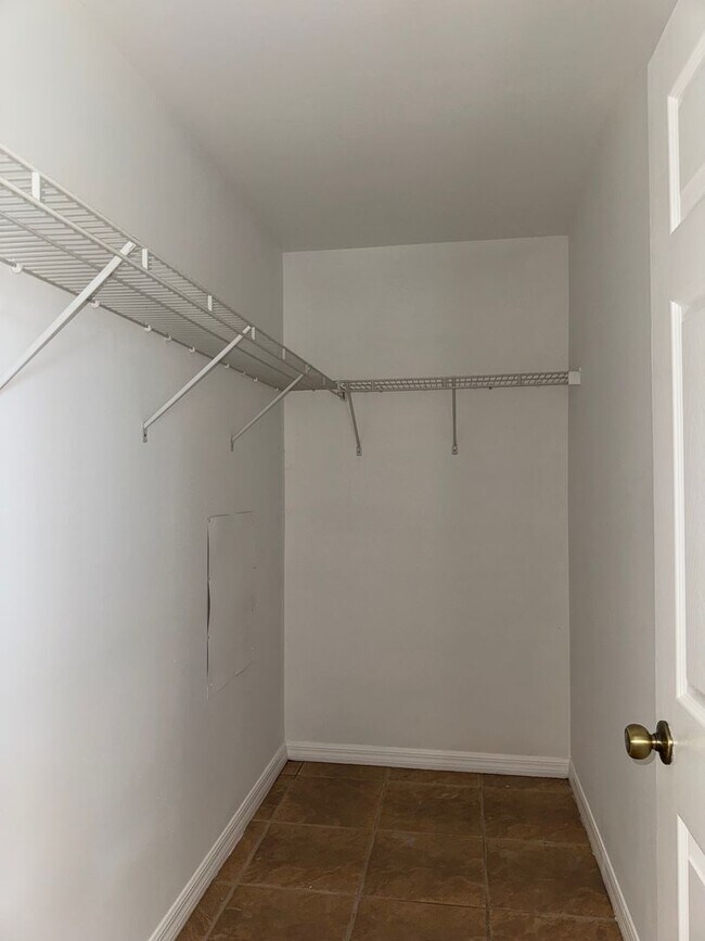 Building Photo - Experience this Cape Coral 3 bedroom 2 bath corner duplex with 1 car garage and screened in lanai.