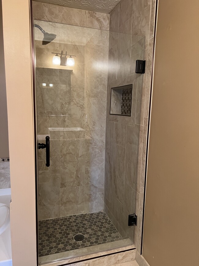 upgraded shower, separate tub for relaxation - 325 parc river blvd