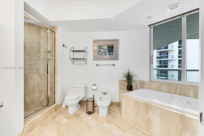 Building Photo - 18671 Collins Ave