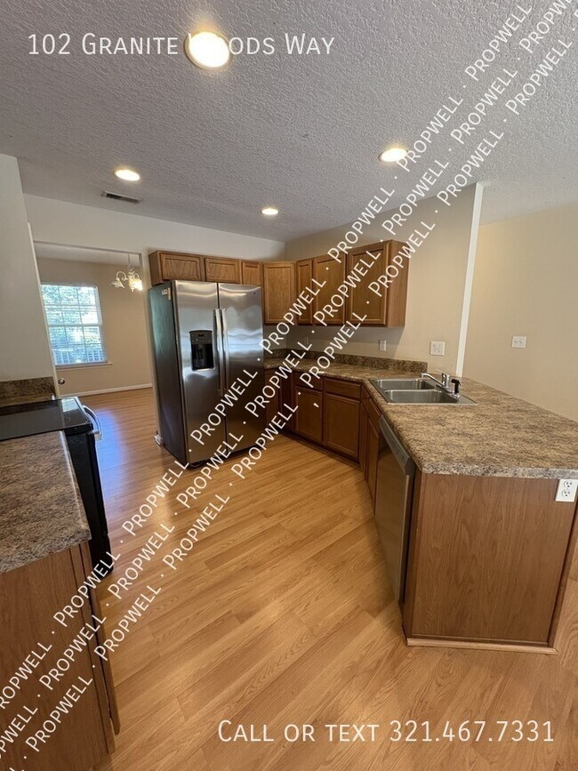 Building Photo - 102 Granite Woods Way
