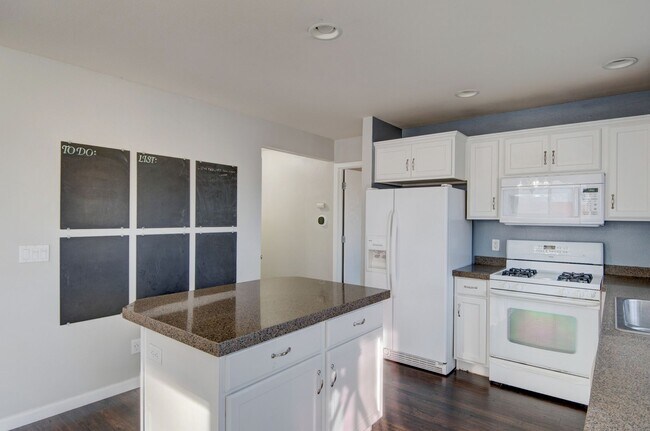 Building Photo - 5-Bedroom Home with Primary Bedroom on Main Floor