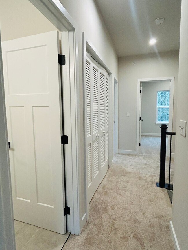 Building Photo - New Construction • 4 BR • 2 Full / 2 Half BA • End Unit Townhome in Village Town – Fayetteville’s...