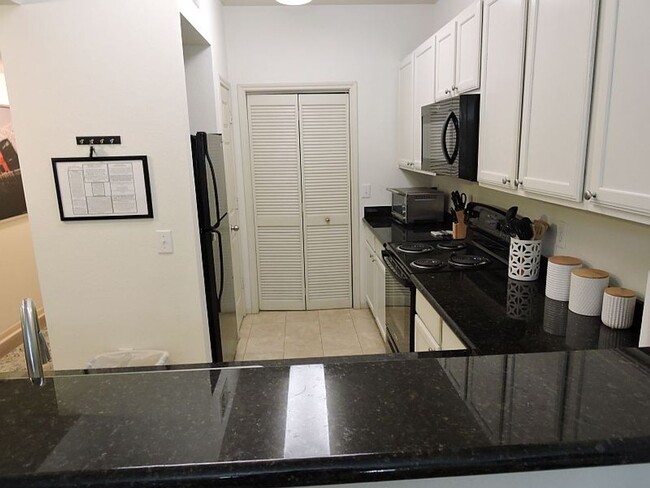 Building Photo - FURNISHED OR UNFURNISHED 3BR/2BA CONDO IN ...