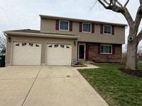 Building Photo - Great Four Bedroom Huber Home