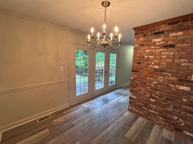 Building Photo - Spacious Multi-Level Brick Home