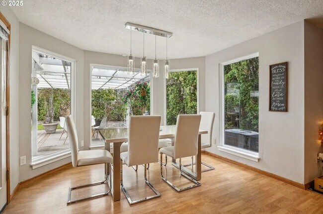 Building Photo - Modern Charm Meets Comfort – Spacious 3-Be...