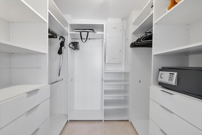 Building Photo - 10275 Collins Ave