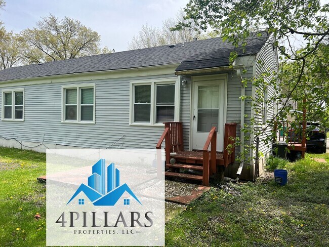 Building Photo - Charming 2 Bedroom Duplex in La Porte with Spacious Layout and Prime Location