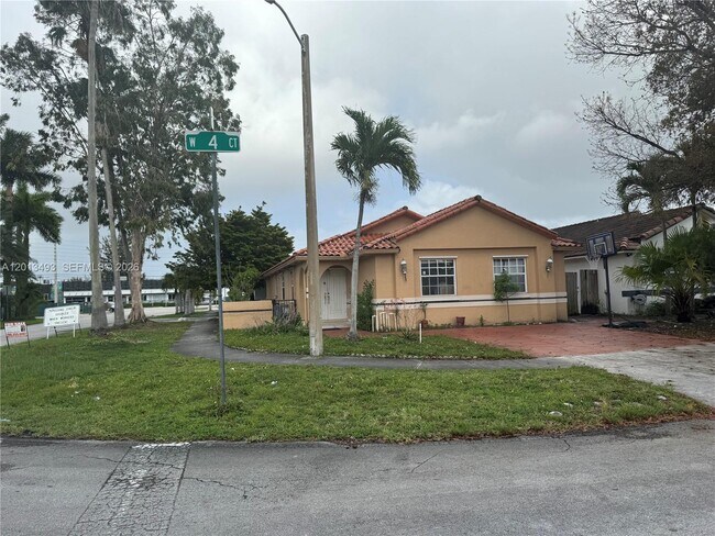 Building Photo - 7599 W 4th Ct