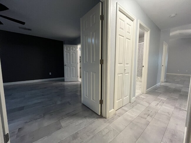 Building Photo - "Charming 4-Bed Oasis with Granite Touch & a Beautiful Pool"