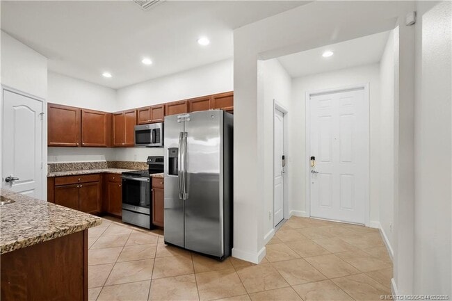 Building Photo - 9512 SW Merlin Ct