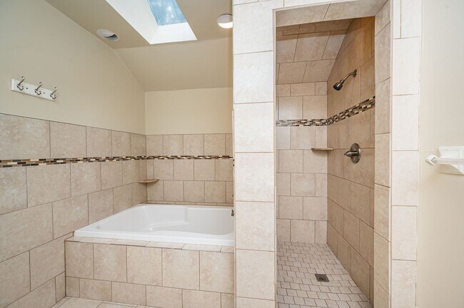Building Photo - Exceptional Contemporary Features Privacy and a Scenic Back Yard.