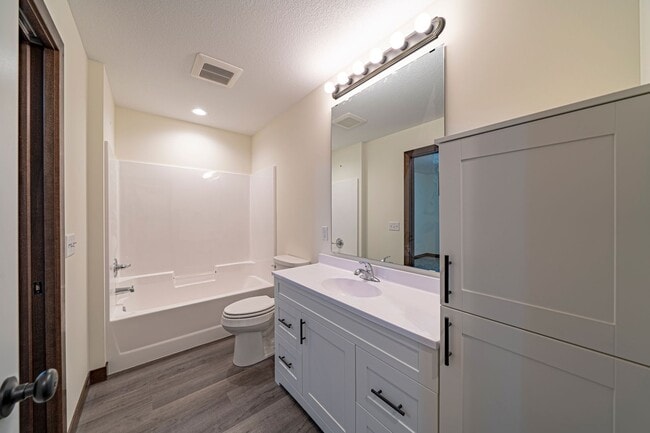 Building Photo - Brand New 5 Bedroom Duplex Unit!