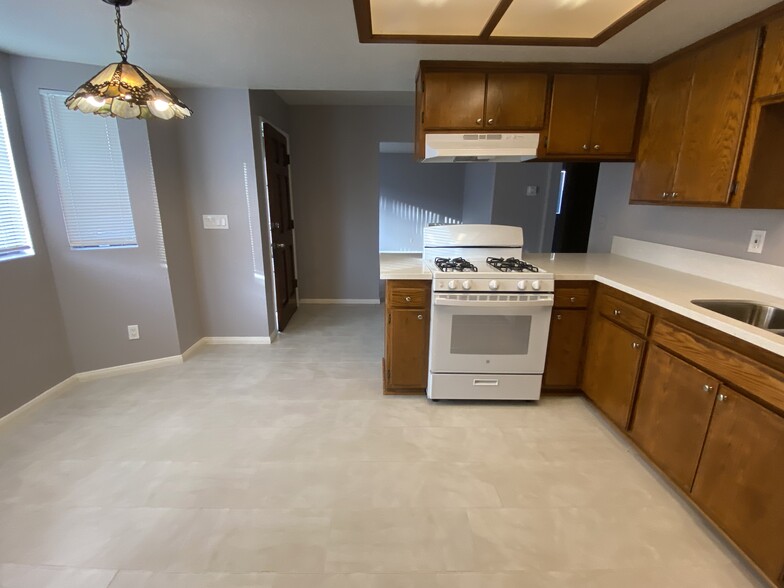 Remold kitchen,new gas stove,tiled floor - 1914 Martina Ave