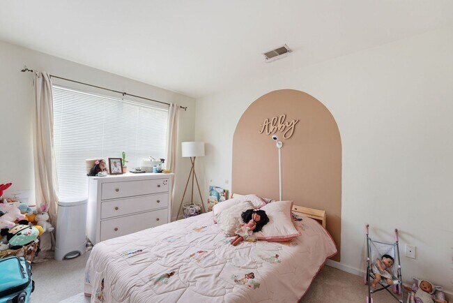 Building Photo - Bathed in natural light, this stunning second level condominium offers an effortless blend of com...