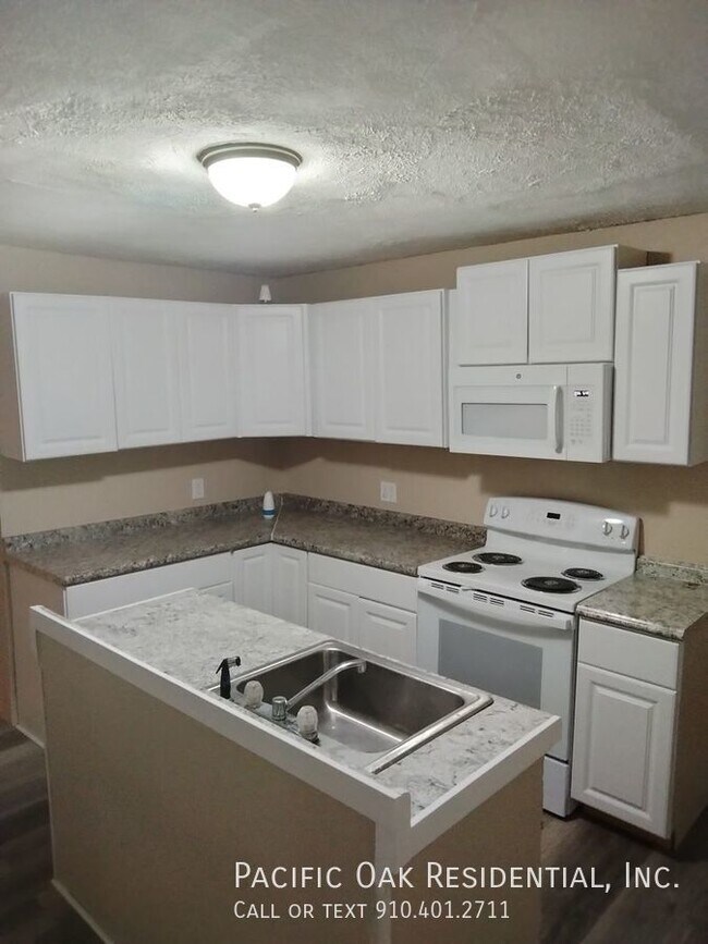 Building Photo - BELOW MARKET RENT!