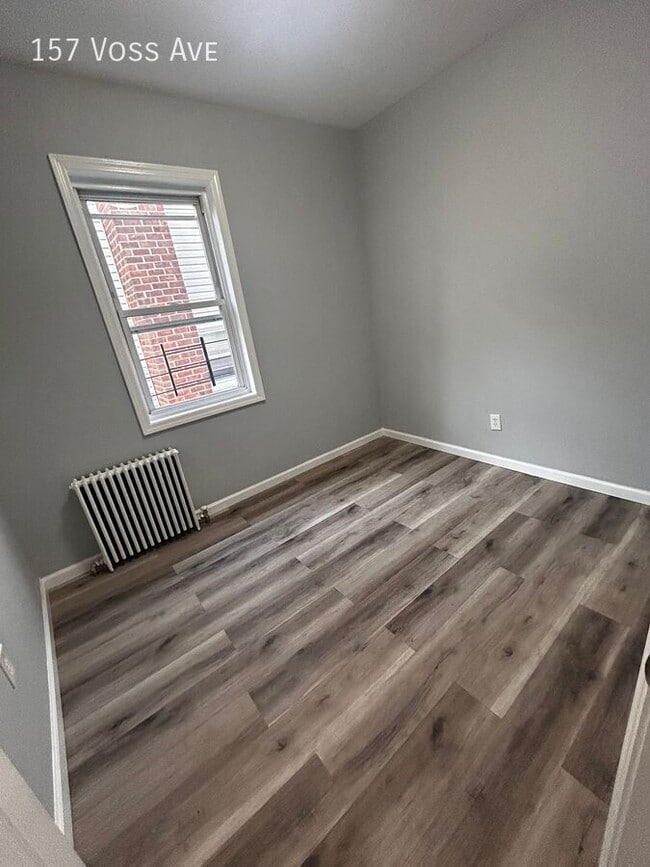 Building Photo - 157 Voss Ave