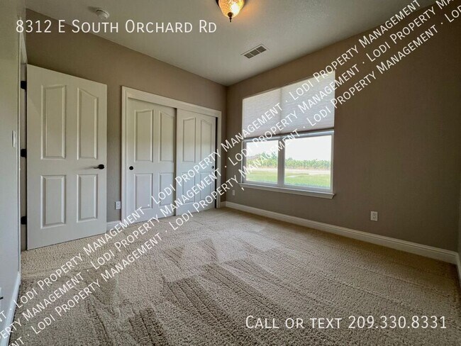 Building Photo - 8312 E Orchard Rd