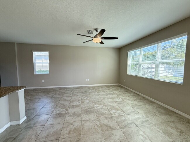Building Photo - Spacious 4-Bedroom Retreat with additional office/den in the Heart of Trinity!