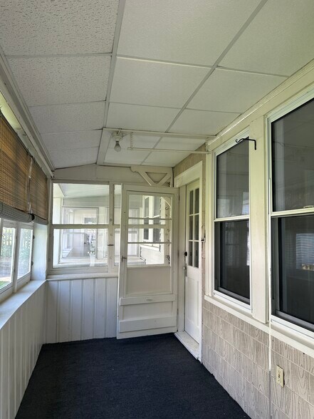 Covered back porch and private entrance - 9 Buxton Ct