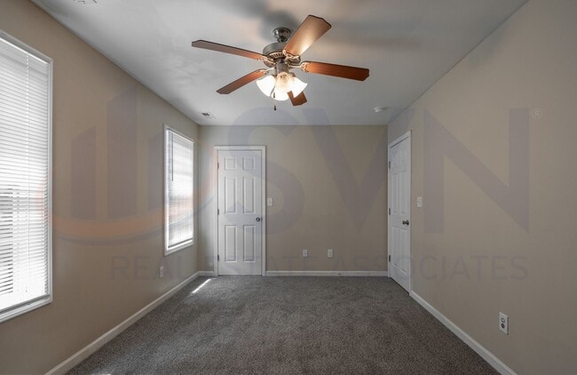 Building Photo - Welcome to this spacious 4-bedroom, 2.5-ba...