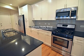 Building Photo - 6454 N Newgard Ave