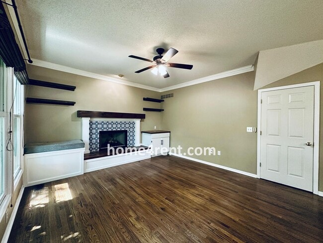 Building Photo - Blue Valley Schools w/ Wood Floors, Finished Basement and a Peaceful, Private Fenced Yard!