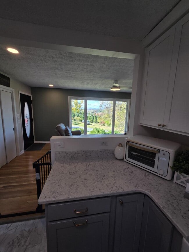 Building Photo - 100 9th Ave