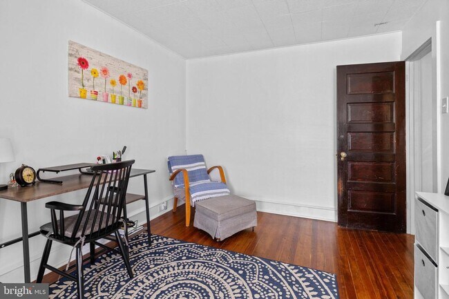 Building Photo - Welcome to this sunny and updated 4-bedroom, 2-bath row home in the heart of Mt. Airy! W/D! Large...