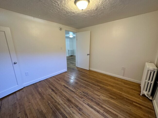 Building Photo - 285-287 N Center St Tri Plex
