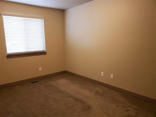 Building Photo - Decreased Rent Option With Long Term Lease...