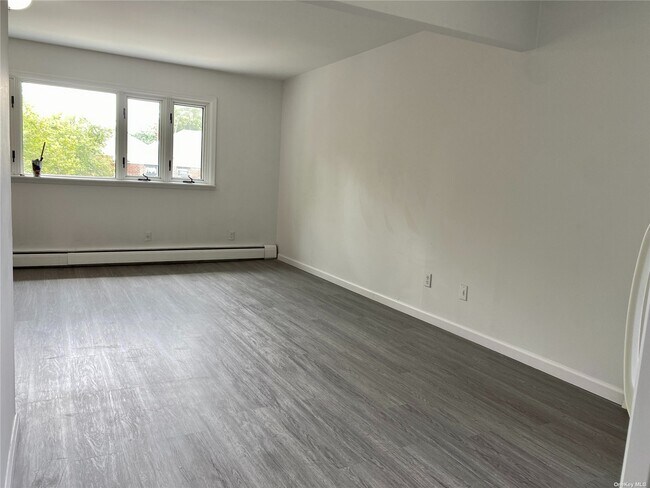 Building Photo - 160-15-16016 16th Ave