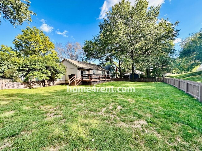 Building Photo - A Lovely, Four Bedroom Lenexa Home w/ Wood...