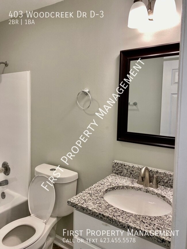 Building Photo - 403 Woodcreek Dr