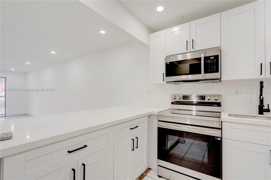 Building Photo - 6095 W 18th Ave