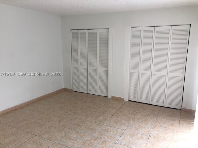 Building Photo - 6575 W 24th Ct