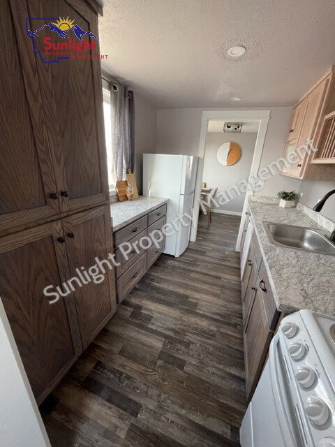 Building Photo - "Charming 1-Bedroom Retreat in Laurel - Cozy 576 Sq Ft Home!"