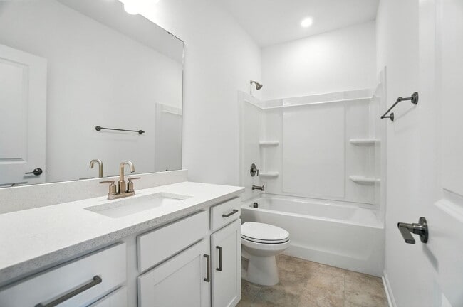 Building Photo - Brand-new three-story townhome in the Univ...