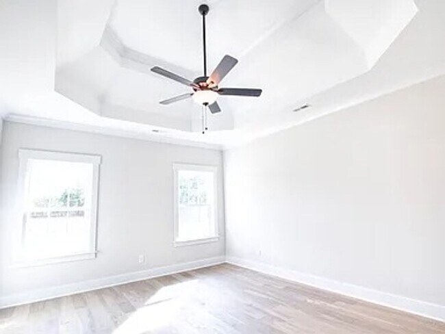 Building Photo - Situated on over 3 acres right in a growin...
