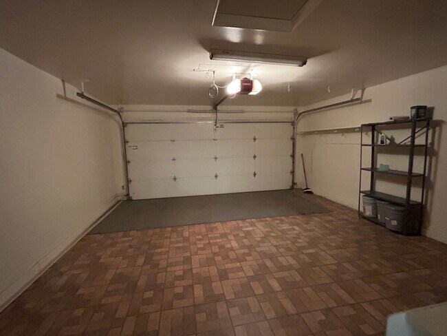 Building Photo - Unique 4 Bedroom, 2 Bathroom with 2 Car Ga...