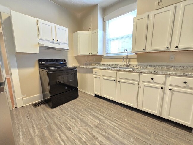 Building Photo - ? Renovated 4-Bedroom Home with Modern Upg...