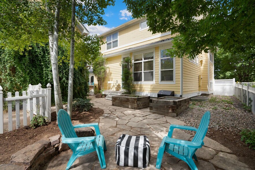 Flagstone patio, raised/irrigated planter boxes, and stone wall seating - 4144 Lost Canyon Drive