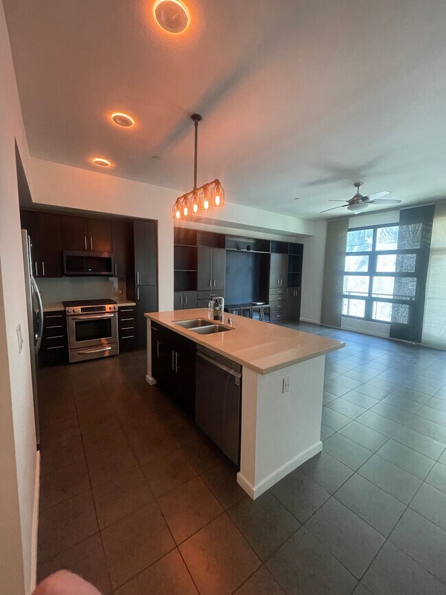 Kitchen lights in 'Night Mode' - 133 The Promenade N