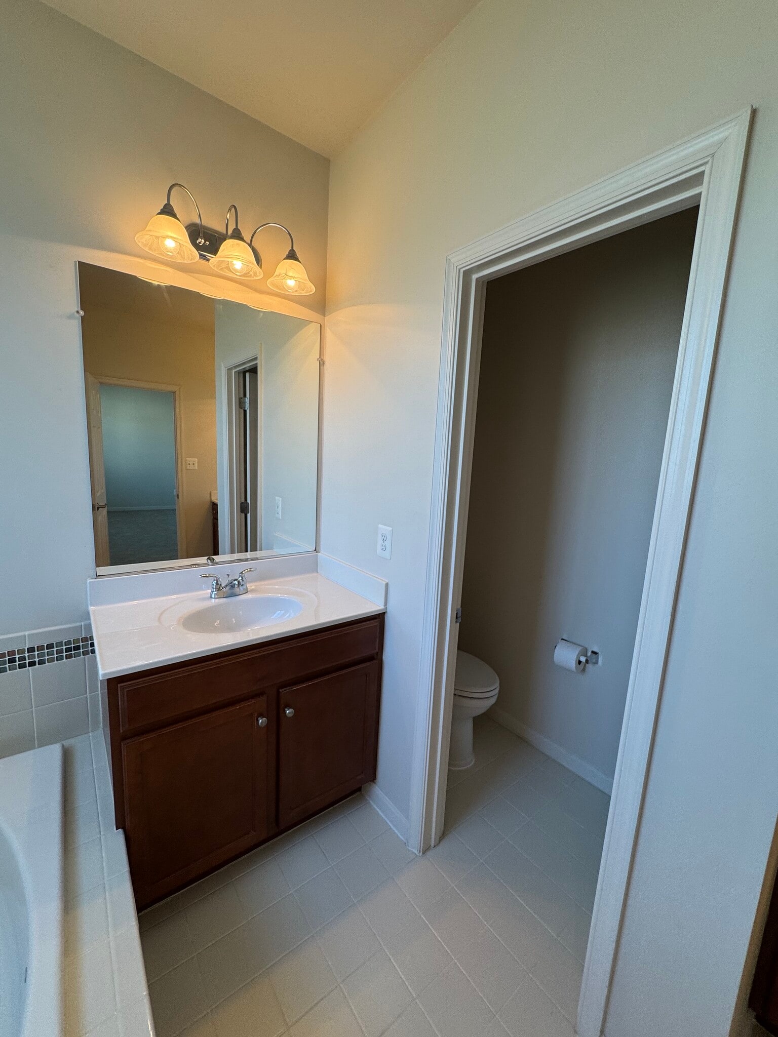 And here is 2 of 2 separate sink vanities with LOTS of storage space. - 44520 Gray Wolf St