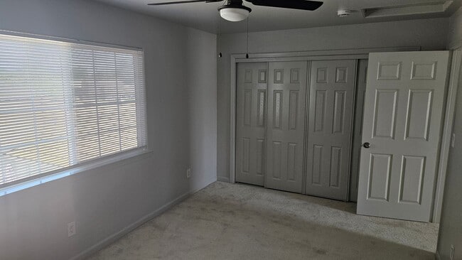 Building Photo - Three Bedroom Two and a half bath house, 2 car garage, central air. Available now.