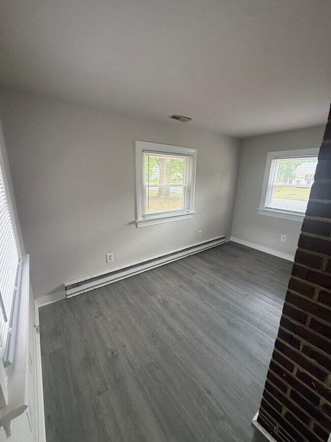 Building Photo - 2-bedroom 1 bathroom Cottage on a large lot with 2 large storage building on site