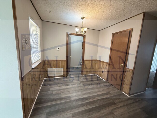 Building Photo - 8401 Woodview Dr N