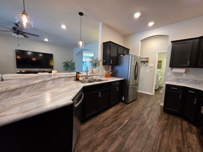 Building Photo - GORGEOUS 4-Bedroom, 3-Bathroom Pool Home, Gated Community