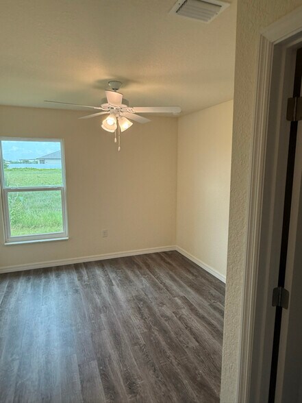 Building Photo - 7038 Lotus Cir